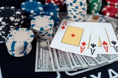 Live dealer conducting Three Card Poker game with multiple camera angles